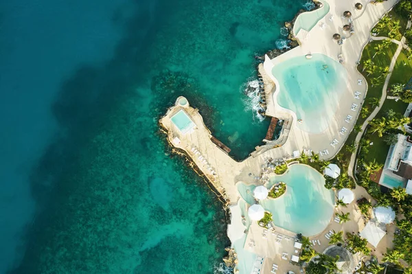 stock image Beautiful caribbean beach in Dominican Republic. Aerial abstract view of tropical idyllic summer landscape with clear blue water, sea coast and white pools. Travel flat background with copyspace