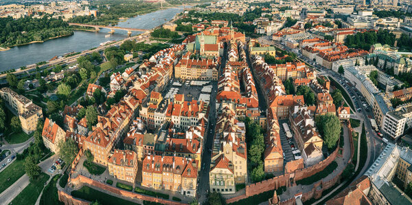 Old city in Warsaw with red roofs, Poland from above. Travel outdoor european background. Panoramic view with wall