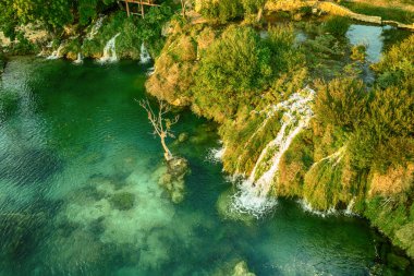 Amazing waterfalls in Zrmanje, Croatia, beautiful landscape, travel attraction, summer touristic concept clipart