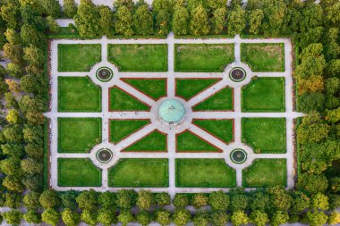 A beautiful symmetric Hofgarten park in Munich, Germany with Diana temple in the center. Flat view from above. Renaissanse architecture clipart