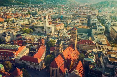 The Stiftskirche Collegiate Church is an inner-city church in Stuttgart, the capital of Baden-Wurttemberg, Germany. View from above with the town buildings clipart