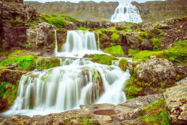 Dynjandi is one the most famous waterfall of the West Fjords during summer, Iceland, amazing view clipart