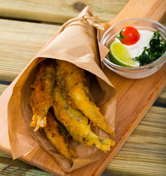 Fish Chips - fried tempura sardines with classic cream-cheese sauce and herbs