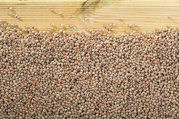 Obraz Stosu Tła Soczewicy Drewnianej Powierzchni Zdrowej Żywności — Zdjęcie stockowe