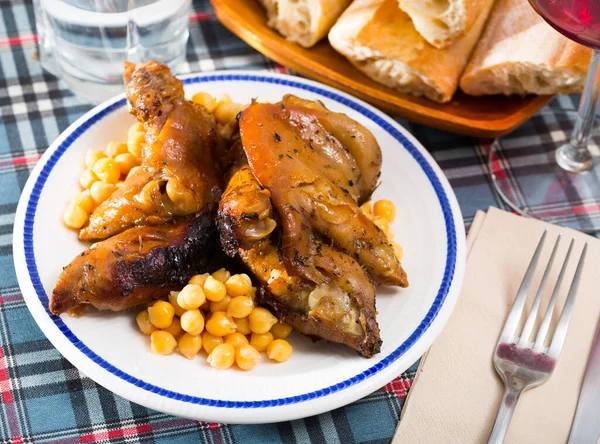 Baked Spicy Pig Trotters Served Garbanzos White Plate — Photo