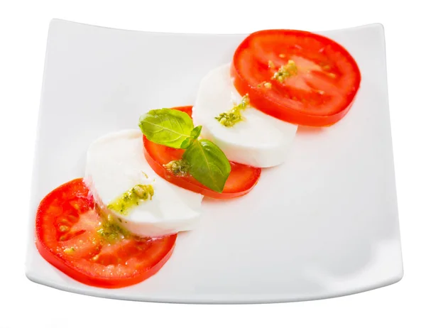 Fresh Italian Caprese Salad Mozzarella Tomatoes White Plate Isolated White — Stock Photo, Image