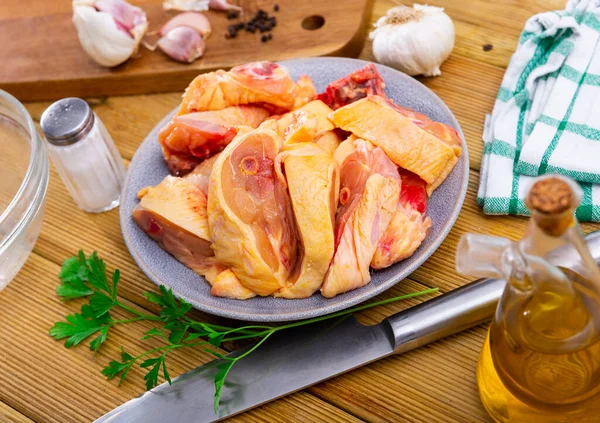 Raw Poultry Plate Fresh Chopped Chicken Condiments Wooden Table Food — Zdjęcie stockowe