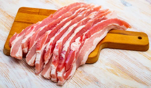 Close Raw Bacon Steaks Wooden Surface Nobody — Stock Photo, Image