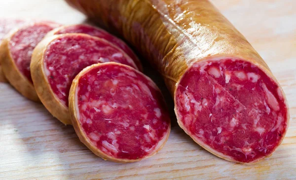 Popular Spanish Salchichon Sausage Sliced Wooden Background — Stock Photo, Image