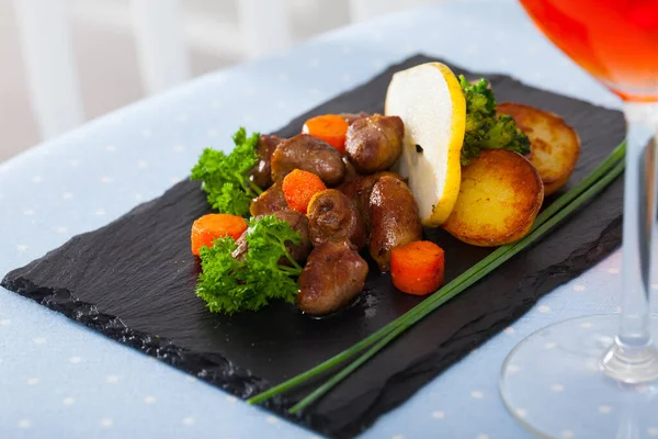 Delicious Fried Chicken Hearts Served Baked Vegetables Fresh Pear Black — Stock Photo, Image
