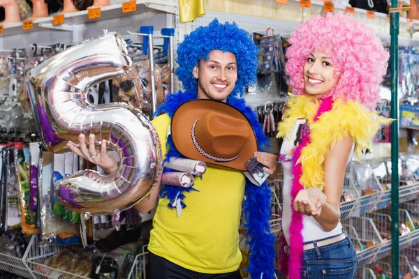 Cheerful Glad Family Couple Preparing Fest Choosing Clown Wigs — Stock Photo, Image