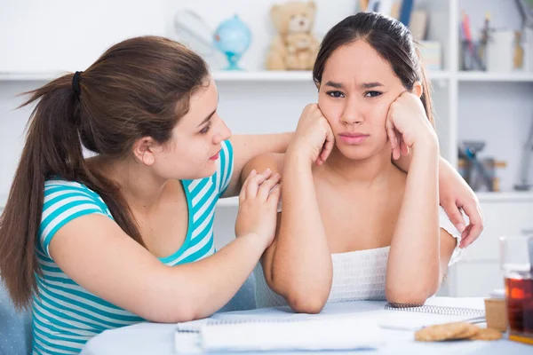 Sad Teenager Girl Sitting Table Home While Female Friend Soothing — Stock Photo, Image