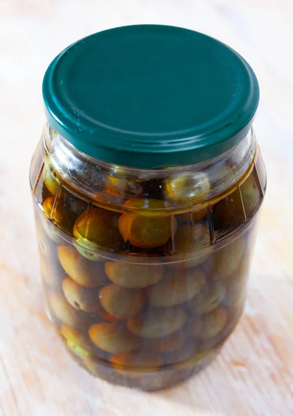 Glass Jar Delicious Whole Olives Wooden Table Nobody — Stock Photo, Image