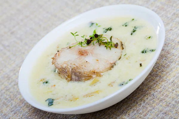 Closeup Boiled Creamy Soup White Fish Pollock Greens Plate — стоковое фото