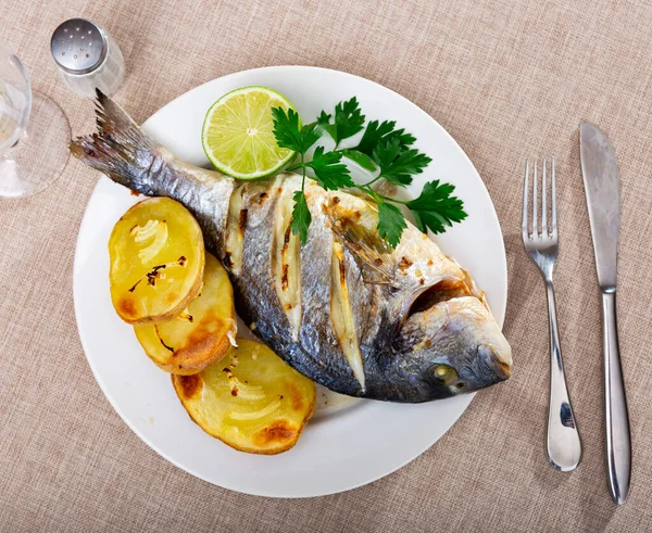 Whole Dorado Fish Potatoes Baked Oven Served Plate Parsley Lemon — Stock Photo, Image