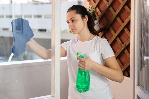 Young Woman Washes Window Apartment — Stock Photo, Image