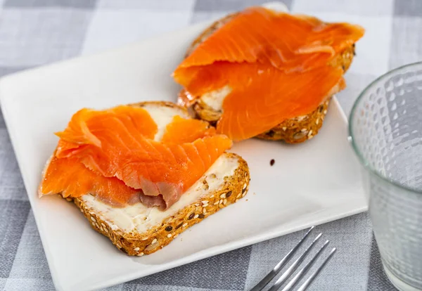 Two Tasty Sandwiches Smoked Salmon Laid White Plate — Stock Photo, Image