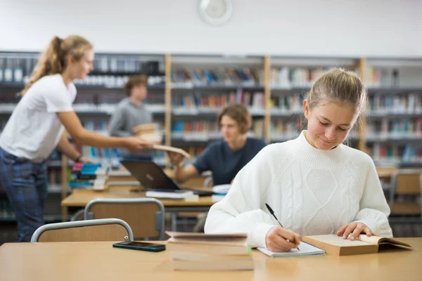 Smart Teenager Girl Spending Time Library Doing Homework — стоковое фото