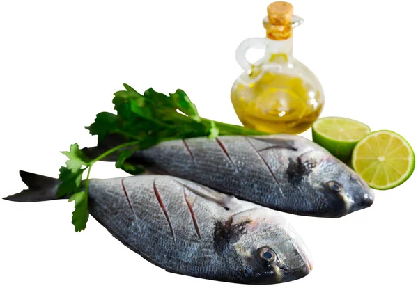 Two Raw Gilt Head Bream Herbs Lime Oil Isolated White — Stock Photo, Image