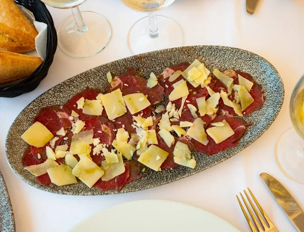 Raw Beef Meat Carpaccio Served Plate Topped Pieces Cheese — Stock Photo, Image