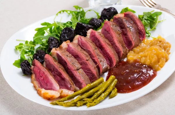 Tasty Roasted Duck Breast Magret Prunes Herbs Sauces Plate — Stock Photo, Image