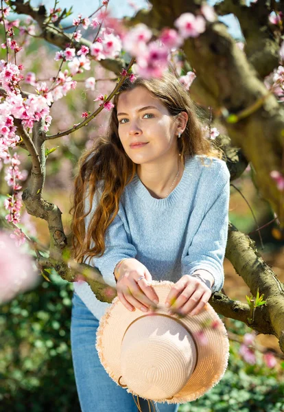 Positive Smiling European Girl Blue Sweater Standing Blossom Tree Sunny — ストック写真