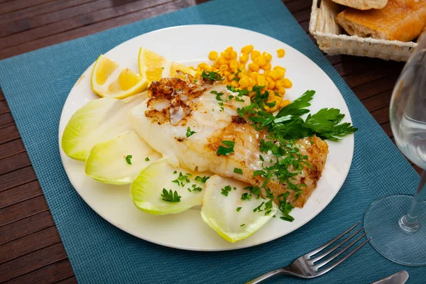 Tasty Fried Codfish Served Endive Greens Corn Spanish Cuisine — Stock Photo, Image