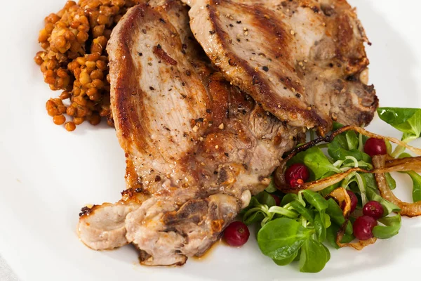 Close Delicious Fried Pork Chop Lentils Herbs Berries Garnish Plate — Stock Photo, Image
