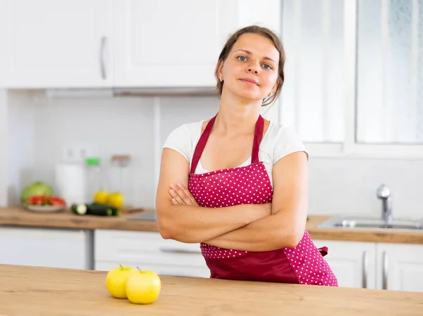 Portrait Positive Girl Housewife Apron Standing Home Kitchen — Stock Photo, Image