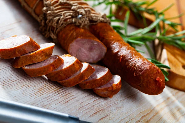 Appetizing Smoked Ham Sausages Wooden Background — Stock Photo, Image
