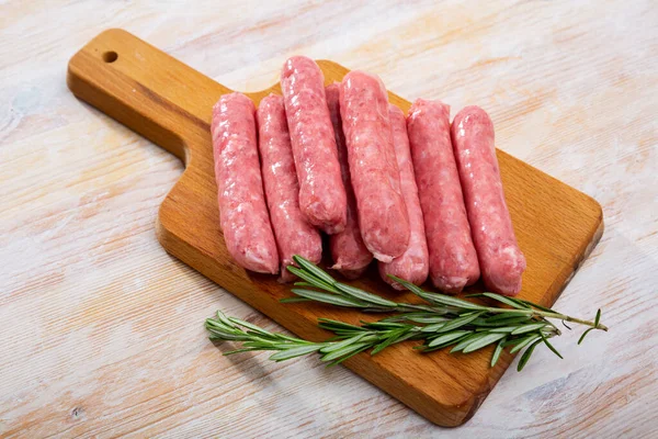 Raw Farm Sausages Rosemary Wooden Table High Quality Photo — Stock Photo, Image