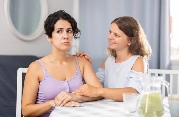 Young Beautiful Girl Comforting Her Depressed Girlfriend Home — Stock Photo, Image