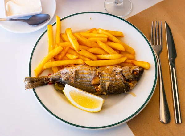 Fried Sarpa Salpa Fish Served White Plate Lemon Slice Garnish — Stock Photo, Image