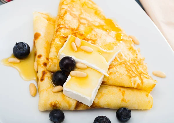 Delicate Thin Pancakes Brie Slices Honey Toasted Pine Nuts Garnished — Stockfoto