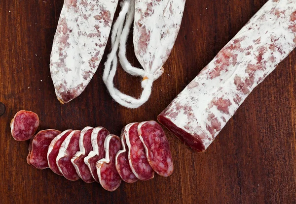 Salsicha Porco Curada Seco Tradicional Catalã Fuet Cortado Superfície Madeira — Fotografia de Stock