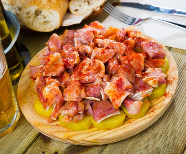 stock image Close up of raw pigs ear with species at plate on table, nobody..