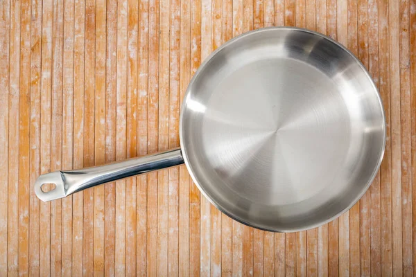 New Shiny Stainless Steel Frying Pan Wooden Table Close Image — Stock Photo, Image