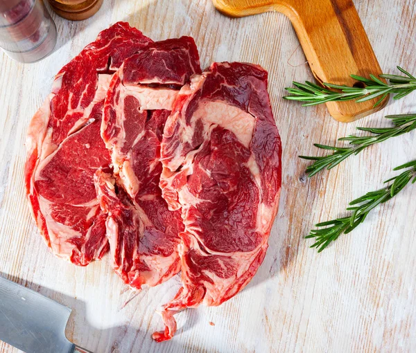 Raw Juicy Veal Steaks Herbs Ready Cooking Wooden Table — Zdjęcie stockowe