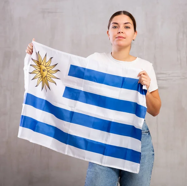 Calm Girl Stands Flag Uruguay Isolated Gray Background — Stock Photo, Image