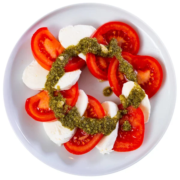 Fresh Caprese Salad Mozzarella Tomatoes Pesto Sauce Plate Isolated White — Stock Photo, Image