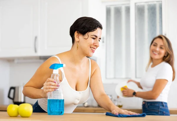 Positive Interested Young Latin American Woman Sister Cleaning House Day — Stock Photo, Image