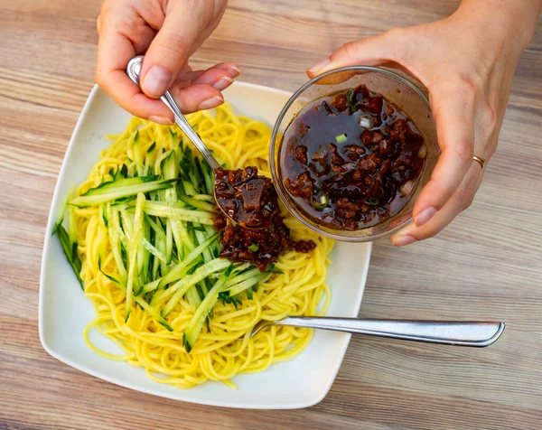 Close Teaspoon Hands Person Putting Mushroom Minced Meat Sauce Noodles — Stock fotografie