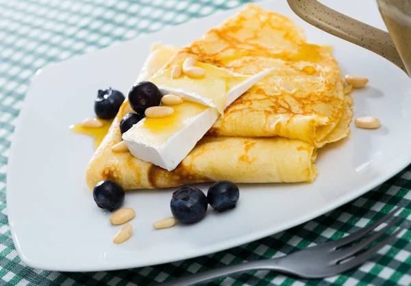Delicate Thin Pancakes Brie Slices Honey Toasted Pine Nuts Garnished — Foto de Stock