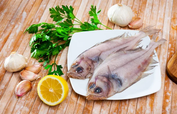 Uncooked Roosterfish Greens Garlic Wooden Board Cooking — Stock Photo, Image