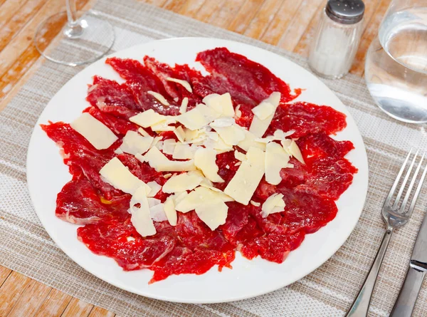 Sliced Carpaccio Raw Beef Meat Plate Top View — Stock Photo, Image
