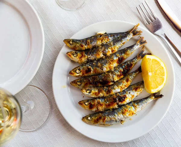 Malaga Cuisine Grilled Sardines Served Lemon White Plate Wooden Table — Stock Photo, Image