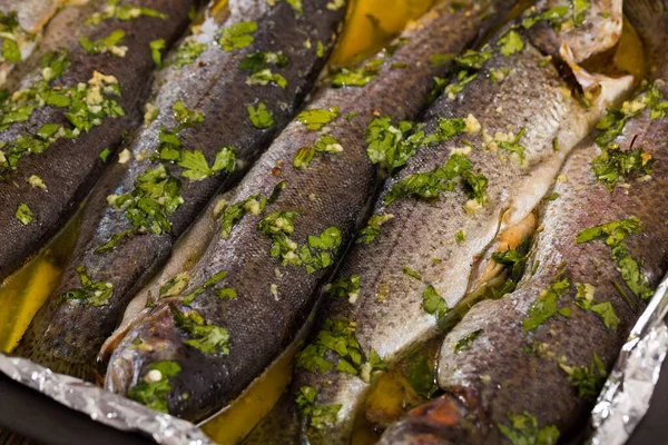 Delicious Trout Baked Oven Served Oil Garlic Green Sauce Foil — Stock Photo, Image