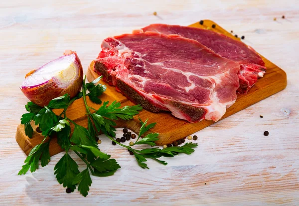 Raw Meat Two Fresh Pork Cutlets Wooden Cutting Board — Stock Photo, Image