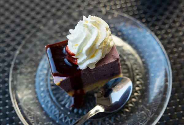 Slice Vanilla Cheesecake Cranberry Jam Plate Spoon Bright Background — Stock Photo, Image
