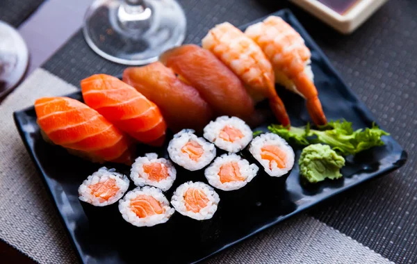 stock image Combined sushi - maki salmon, nigiri variado closeup. Japanese cuisine